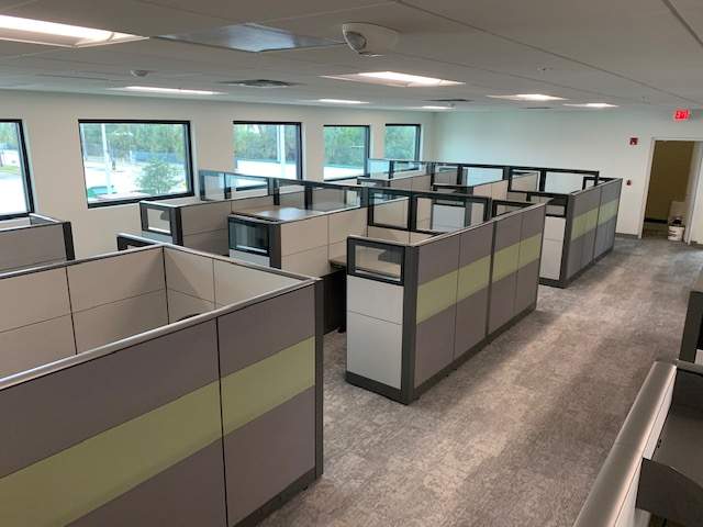 Pre-owned cubicles in business environment